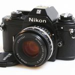 NIKON EM 35MM SLR CAMERA W/50MM F/1.8 LENS