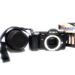 Minolta Maxxum 7000 Autofocus SLR 35mm Film camera with Minolta AF 35-70mm Lens in Working condition and Strap