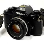 Nikon Em 35mm SLR Film Camera Black Body With Nikon F mount 50MM F1.8 AI Manual focus Lens. (Renewed)